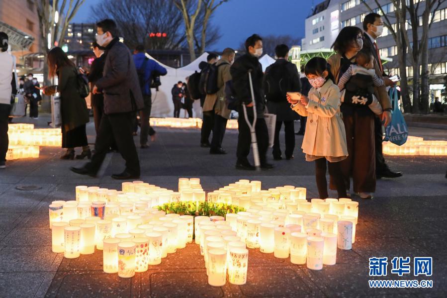 日本各地民众悼念“3·11”大地震遇难者