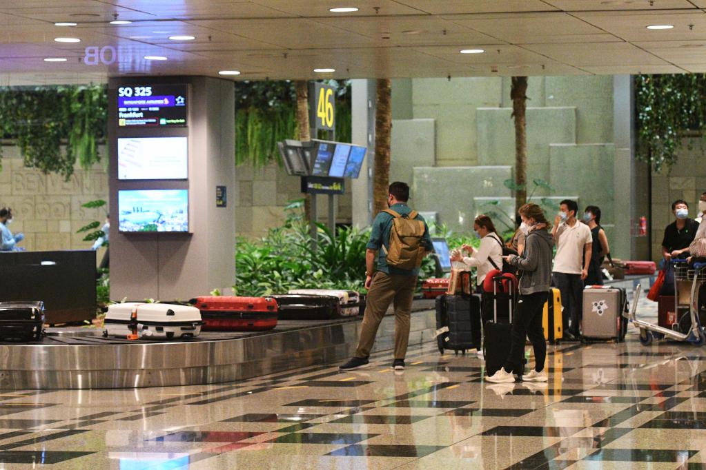 全球连线丨新加坡卫生部长 ：不会对中国旅客收紧防疫措施