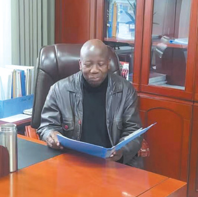 为促进中国发展和国际合作贡献力量